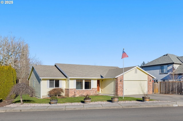 single story home featuring a garage