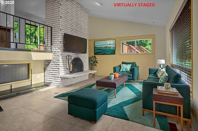 32813 NW Peak Rd, Scappoose, OR 97056 - living room with a brick fireplace, vaulted ceiling, and tile patterned floors