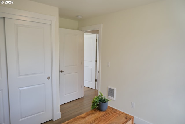 46412 Lyons Mill City Dr, Lyons, OR 97358 - unfurnished bedroom with wood finished floors, visible vents, and a closet