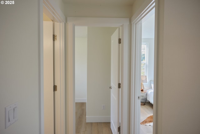 46412 Lyons Mill City Dr, Lyons, OR 97358 - hallway with baseboards and light wood finished floors