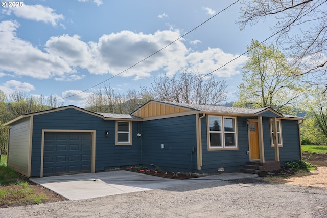 46412 Lyons Mill City Dr, Lyons, OR 97358 - ranch-style home with concrete driveway, board and batten siding, and a garage