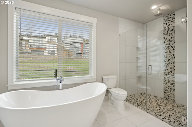 1730 N 12th St, Washougal, WA 98671 - bathroom featuring a shower stall, a freestanding bath, tile patterned floors, and healthy amount of natural light