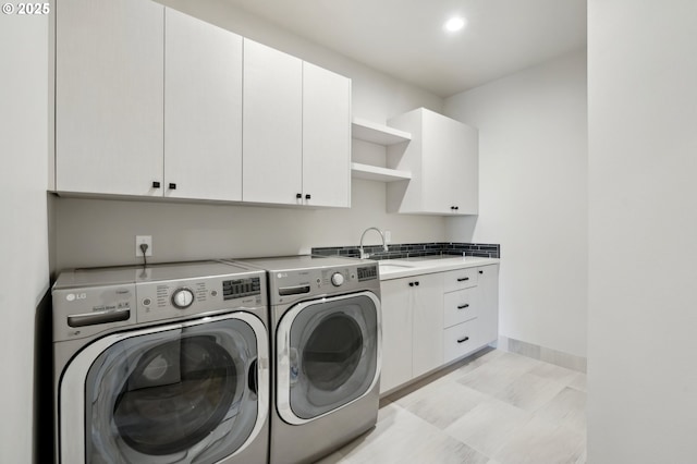 1730 N 12th St, Washougal, WA 98671 - laundry area with washing machine and dryer, cabinet space, baseboards, and recessed lighting