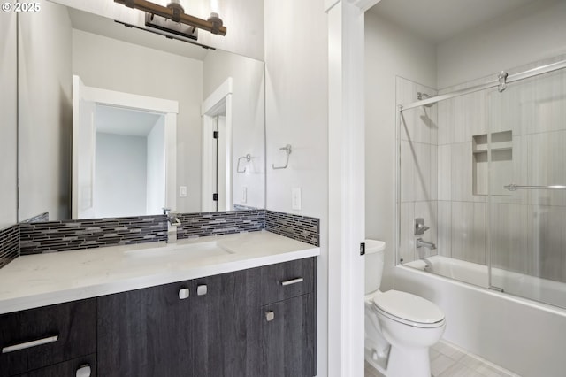 1730 N 12th St, Washougal, WA 98671 - full bathroom featuring toilet, vanity, backsplash, and enclosed tub / shower combo