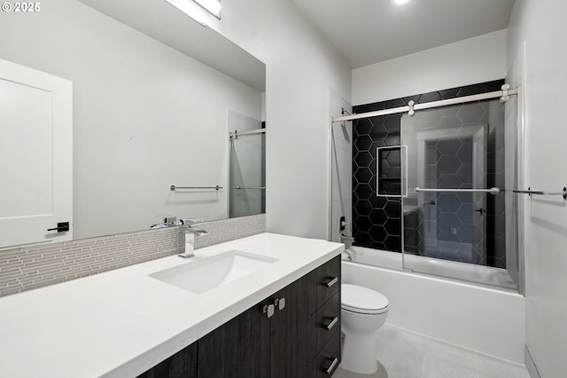 1730 N 12th St, Washougal, WA 98671 - bathroom featuring vanity, toilet, shower / bath combination with glass door, tasteful backsplash, and tile patterned flooring