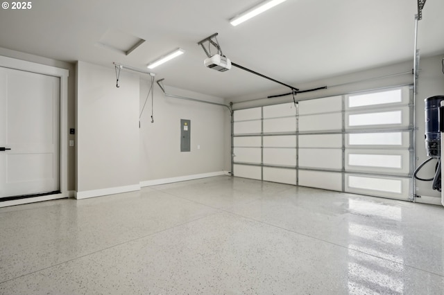 1730 N 12th St, Washougal, WA 98671 - garage featuring electric panel, a garage door opener, and baseboards