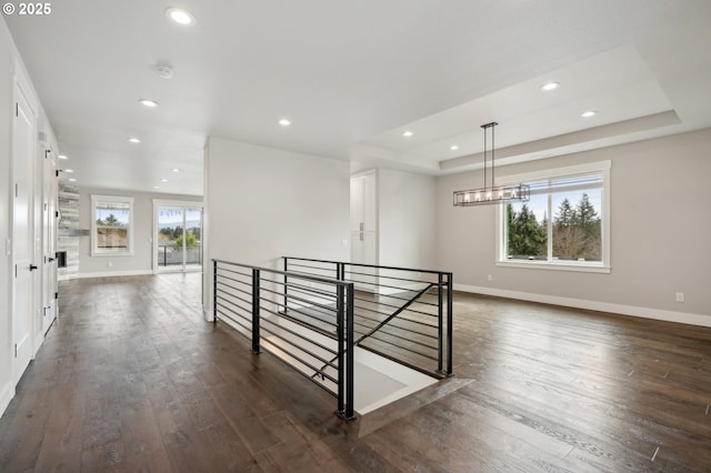 1730 N 12th St, Washougal, WA 98671 - hall featuring an upstairs landing, dark wood-style floors, baseboards, recessed lighting, and a tray ceiling