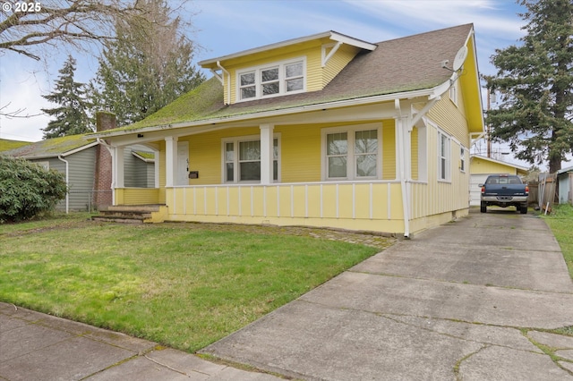 bungalow-style home featuring a porch and a front yard