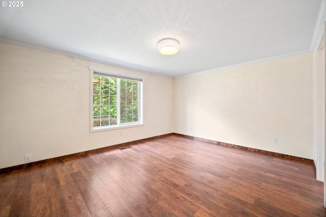 1602 NE 16th Ct, Battle Ground, WA 98604 - empty room featuring wood finished floors, crown molding, and baseboards