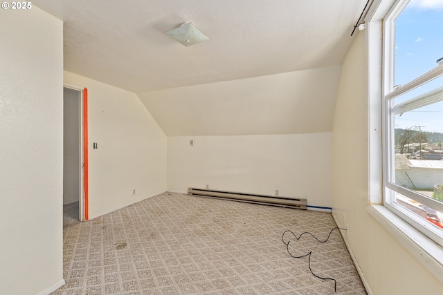 180 W Second Ave, Sutherlin, OR 97479 - bonus room with a baseboard radiator, lofted ceiling, carpet, and baseboards