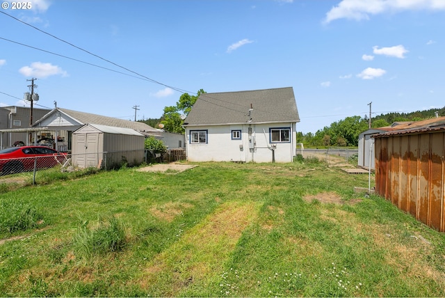 180 W Second Ave, Sutherlin, OR 97479 - back of property featuring a storage shed, an outbuilding, and stucco siding