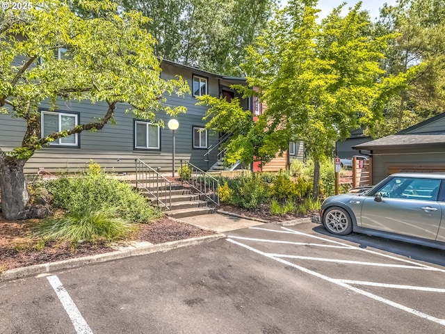 12642 NW Barnes Rd Unit 10, Portland, OR 97229 - view of front of property featuring uncovered parking and stairs