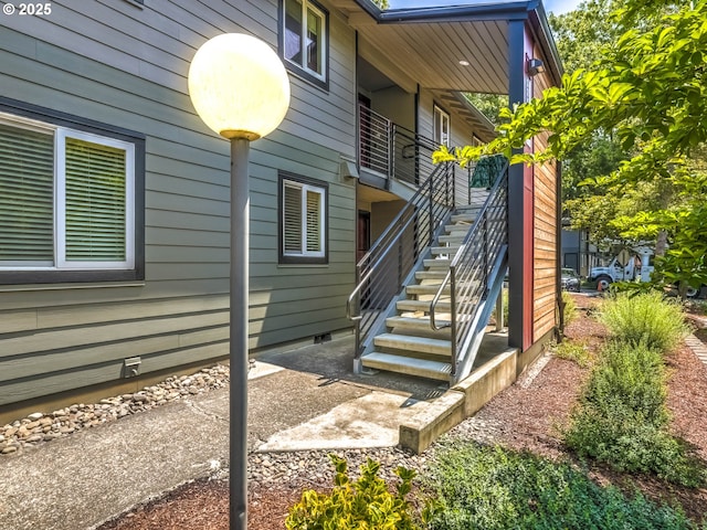 12642 NW Barnes Rd Unit 10, Portland, OR 97229 - view of home's exterior featuring stairway and crawl space
