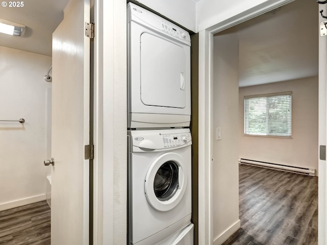 12642 NW Barnes Rd Unit 10, Portland, OR 97229 - laundry area with estacked washer and dryer, baseboard heating, and dark wood-style flooring