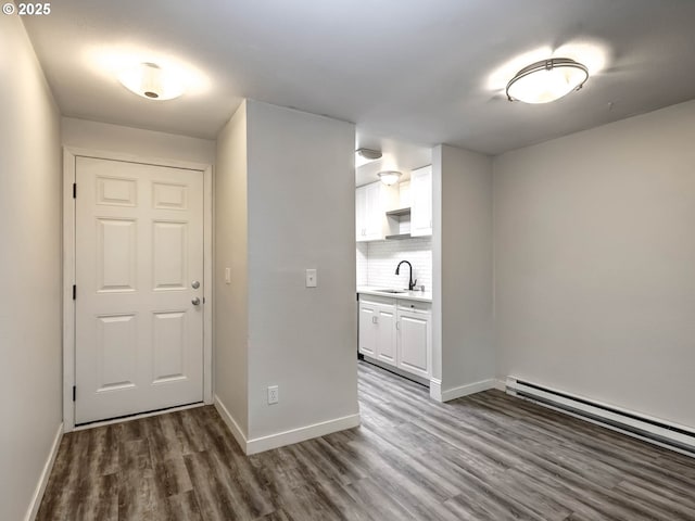 12642 NW Barnes Rd Unit 10, Portland, OR 97229 - interior space with baseboard heating and wood finished floors