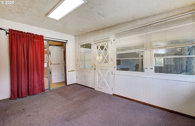 8400 Cason Rd, Gladstone, OR 97027 - carpeted empty room featuring baseboards and a textured ceiling