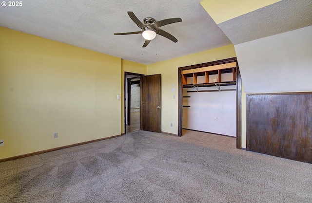 8400 Cason Rd, Gladstone, OR 97027 - unfurnished bedroom featuring a textured ceiling, carpet, ceiling fan, and a closet