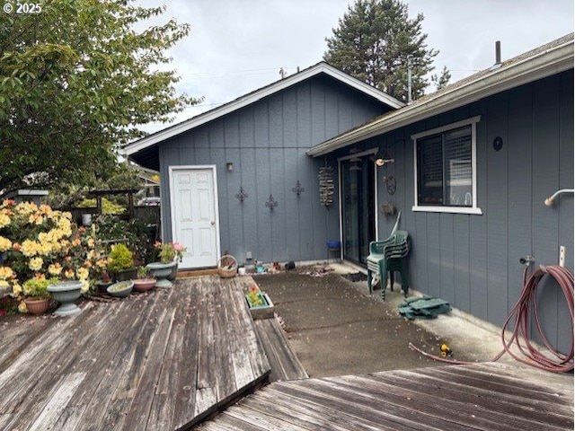 2640 Virginia Ave, North Bend, OR 97459 - back of property with a wooden deck