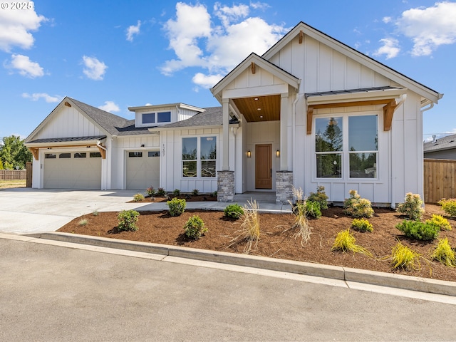 1207 NW 150th St, Vancouver, WA 98685 - modern farmhouse style home with board and batten siding, roof with shingles, a garage, and concrete driveway
