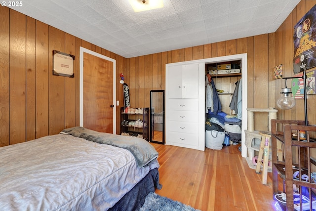 1648 Augusta St, Eugene, OR 97403 - bedroom featuring wood walls and wood finished floors