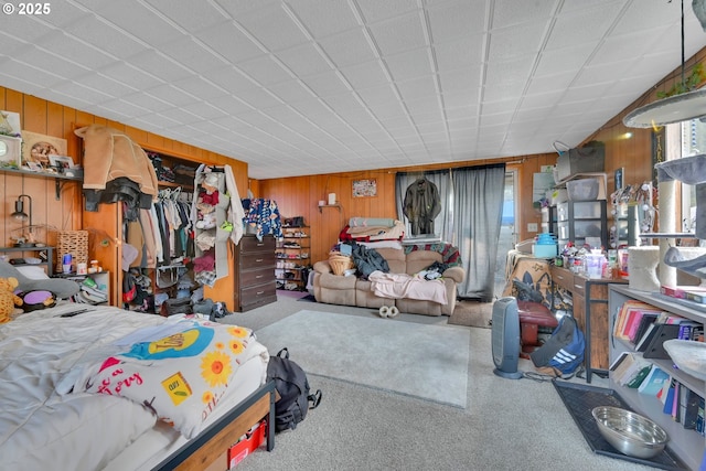 1648 Augusta St, Eugene, OR 97403 - bedroom featuring carpet floors, wooden walls, and a closet