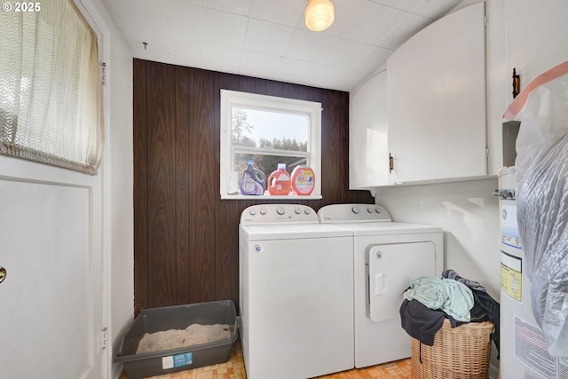 1648 Augusta St, Eugene, OR 97403 - laundry area featuring washer and dryer and cabinet space