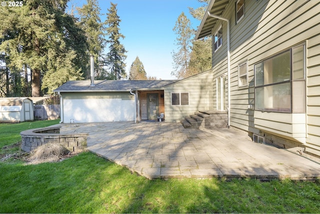 exterior space with a patio, an outbuilding, a lawn, and a shed