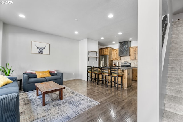 125 N 44th Pl, Ridgefield, WA 98642 - living area with dark wood-type flooring and recessed lighting