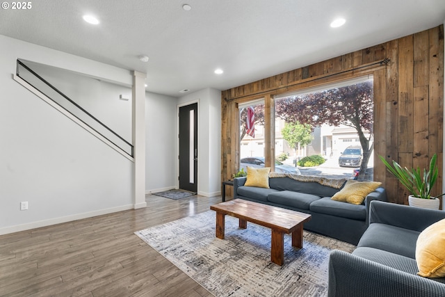 125 N 44th Pl, Ridgefield, WA 98642 - living area featuring wooden walls, recessed lighting, and wood finished floors