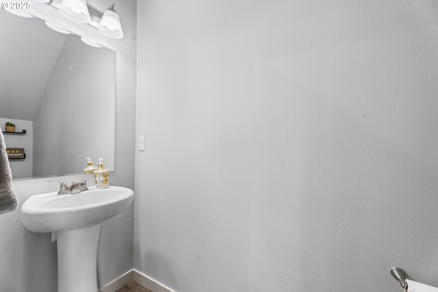 125 N 44th Pl, Ridgefield, WA 98642 - bathroom with vaulted ceiling and a sink