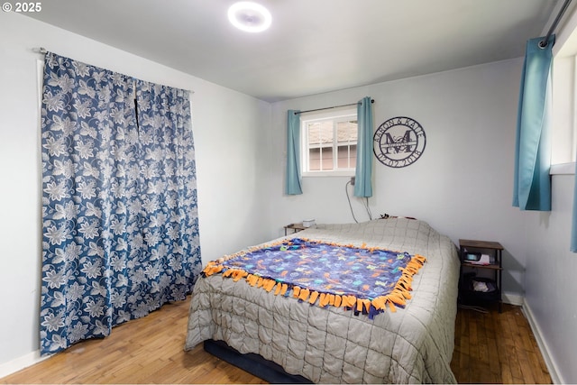 3426 Royal Ave, Eugene, OR 97402 - bedroom featuring wood-type flooring and baseboards