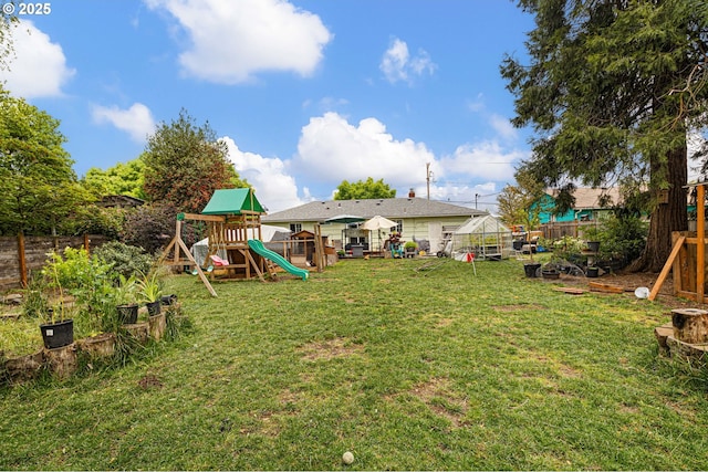 3426 Royal Ave, Eugene, OR 97402 - view of yard with a playground and a greenhouse