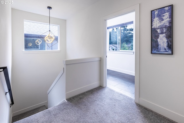 19386 Juniper Ct, Oregon City, OR 97045 - hall featuring carpet floors, baseboards, and an upstairs landing