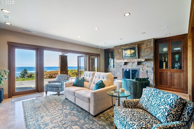 280 Fall Creek Dr, Oceanside, OR 97134 - living area with a stone fireplace and recessed lighting