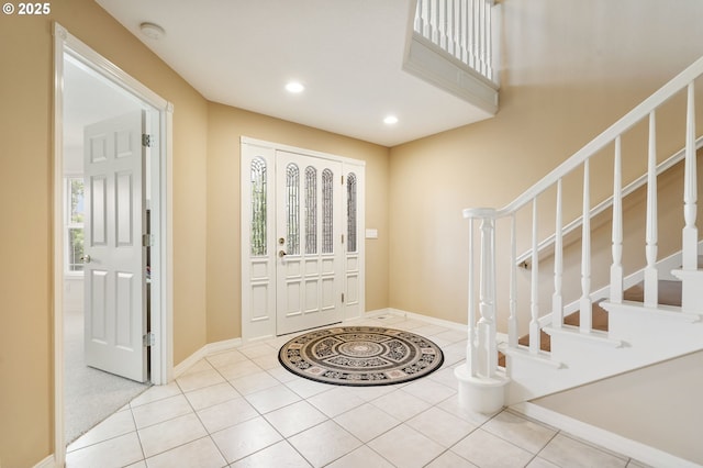 12345 SE Wagner St, Happy Valley, OR 97086 - tiled entryway featuring stairway, recessed lighting, and baseboards