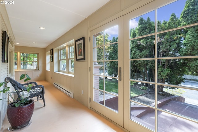 entryway with french doors and a baseboard radiator