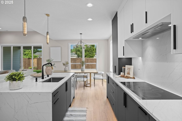 6803 NW 24th Ct, Vancouver, WA 98665 - kitchen featuring black electric stovetop, healthy amount of natural light, recessed lighting, and pendant lighting