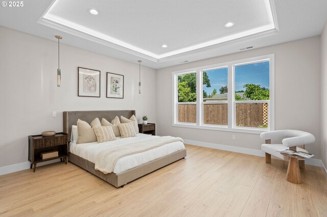 6803 NW 24th Ct, Vancouver, WA 98665 - bedroom with a tray ceiling, light wood-style flooring, and recessed lighting