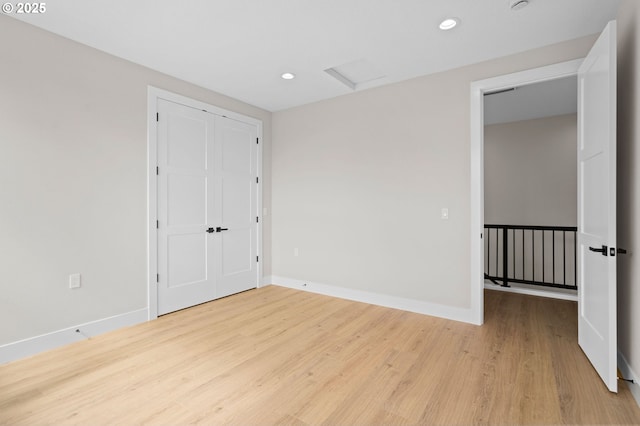 6803 NW 24th Ct, Vancouver, WA 98665 - unfurnished bedroom with attic access, wood finished floors, recessed lighting, and a closet