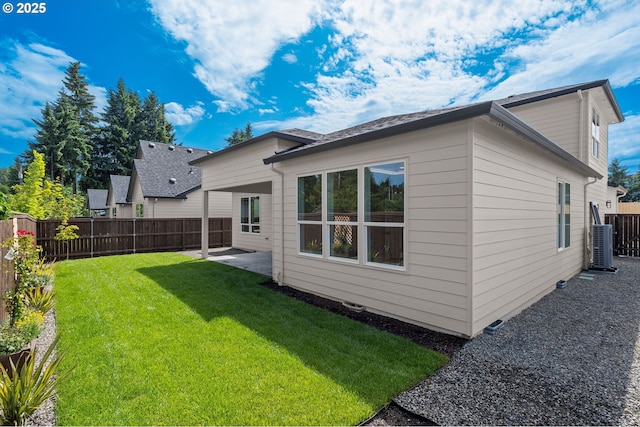 6803 NW 24th Ct, Vancouver, WA 98665 - rear view of house with a fenced backyard and a patio area