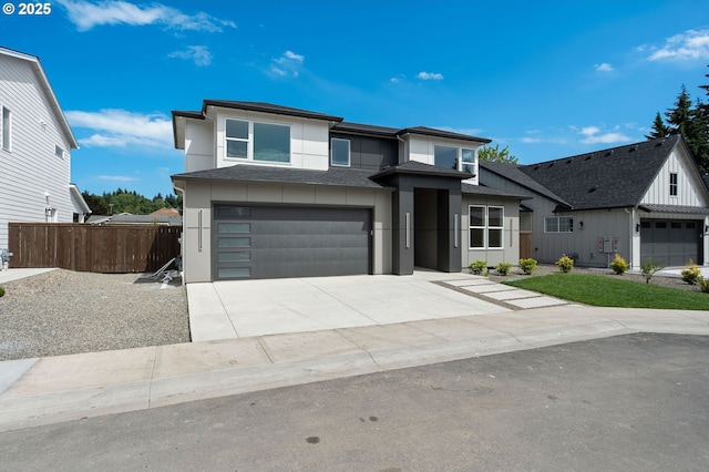 6803 NW 24th Ct, Vancouver, WA 98665 - view of front facade with a garage, stucco siding, driveway, and a shingled roof