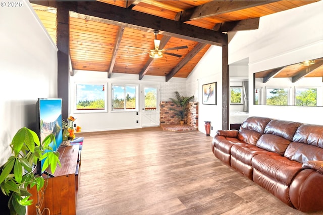 32890 Hillside Acres Rd, Gold Beach, OR 97444 - living room featuring ceiling fan, baseboards, wooden ceiling, wood finished floors, and vaulted ceiling with beams
