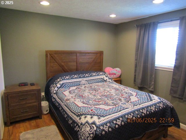 bedroom featuring light hardwood / wood-style floors