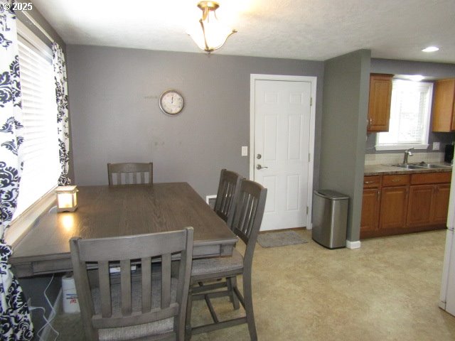 kitchen with white appliances and sink