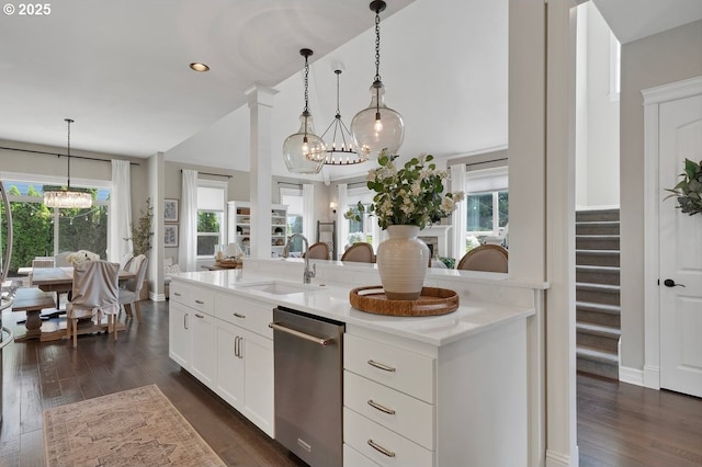1720 W Meadows Dr NW, Salem, OR 97304 - kitchen featuring a chandelier, a sink, stainless steel dishwasher, dark wood-style flooring, and lofted ceiling