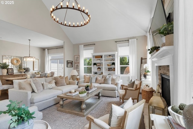 1720 W Meadows Dr NW, Salem, OR 97304 - living room featuring a chandelier, high vaulted ceiling, and a fireplace