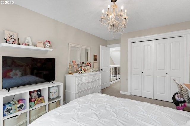 1720 W Meadows Dr NW, Salem, OR 97304 - bedroom with a chandelier, carpet floors, a closet, and baseboards