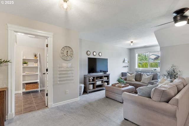 1720 W Meadows Dr NW, Salem, OR 97304 - living area featuring carpet floors, ceiling fan, and baseboards