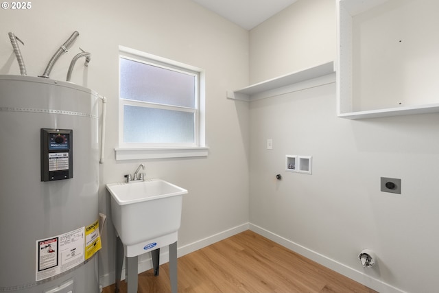 4221 Hudson Ave, Salem, OR 97301 - laundry room with water heater, washer hookup, hookup for an electric dryer, and light wood finished floors