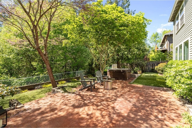 view of patio featuring a hot tub